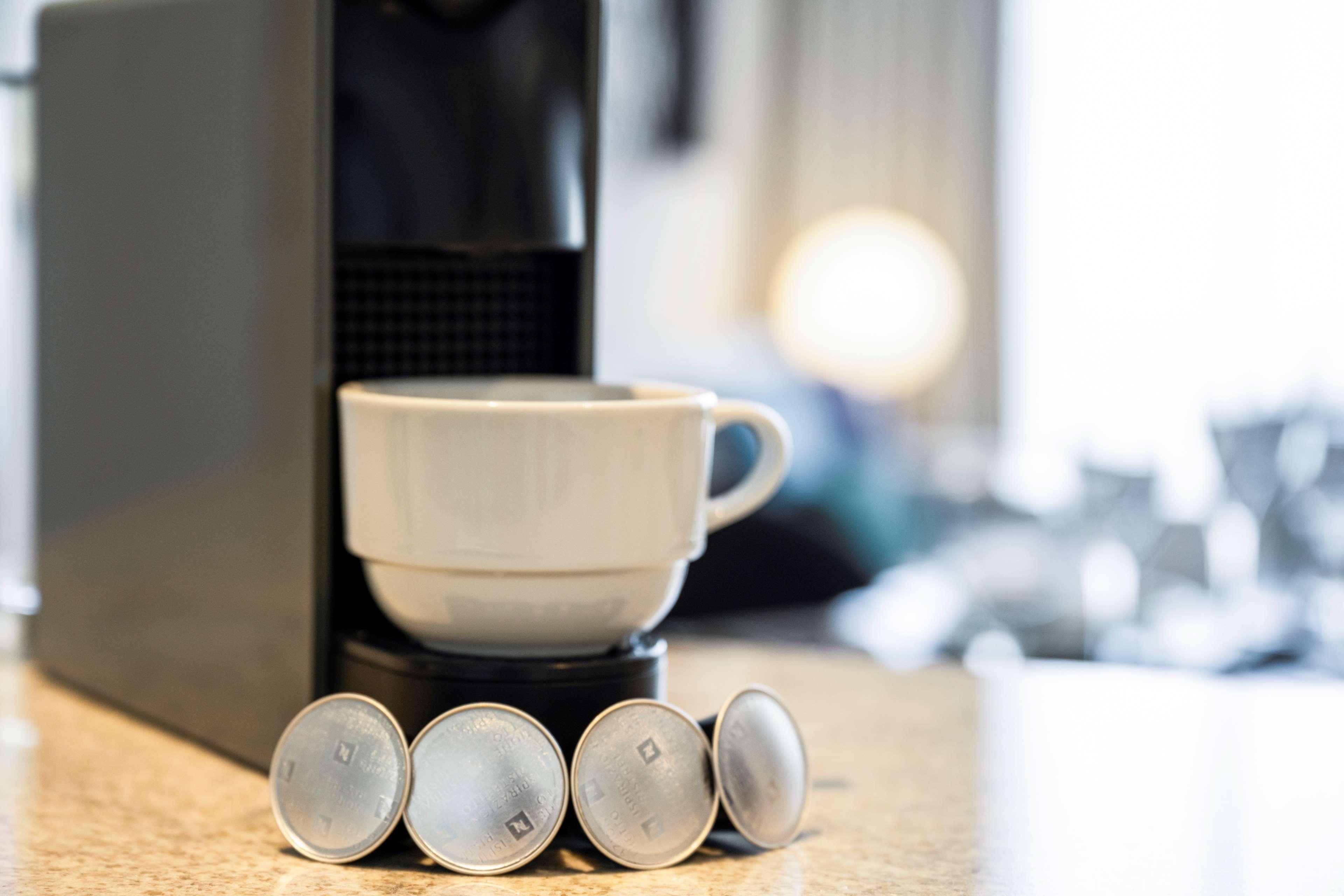 Aleph Doha Residences, Curio Collection By Hilton Exterior foto A Nespresso machine