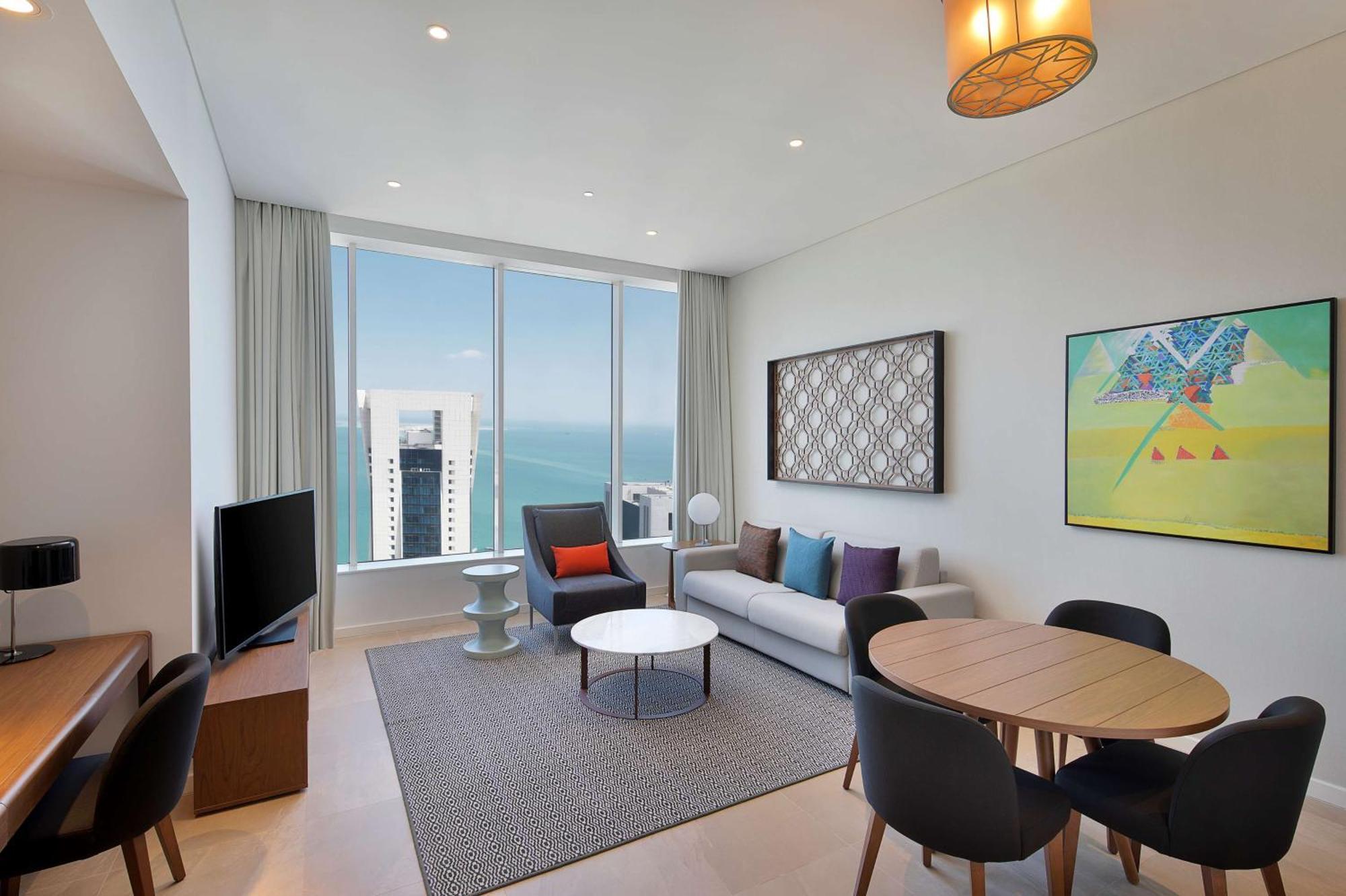 Aleph Doha Residences, Curio Collection By Hilton Exterior foto Living room