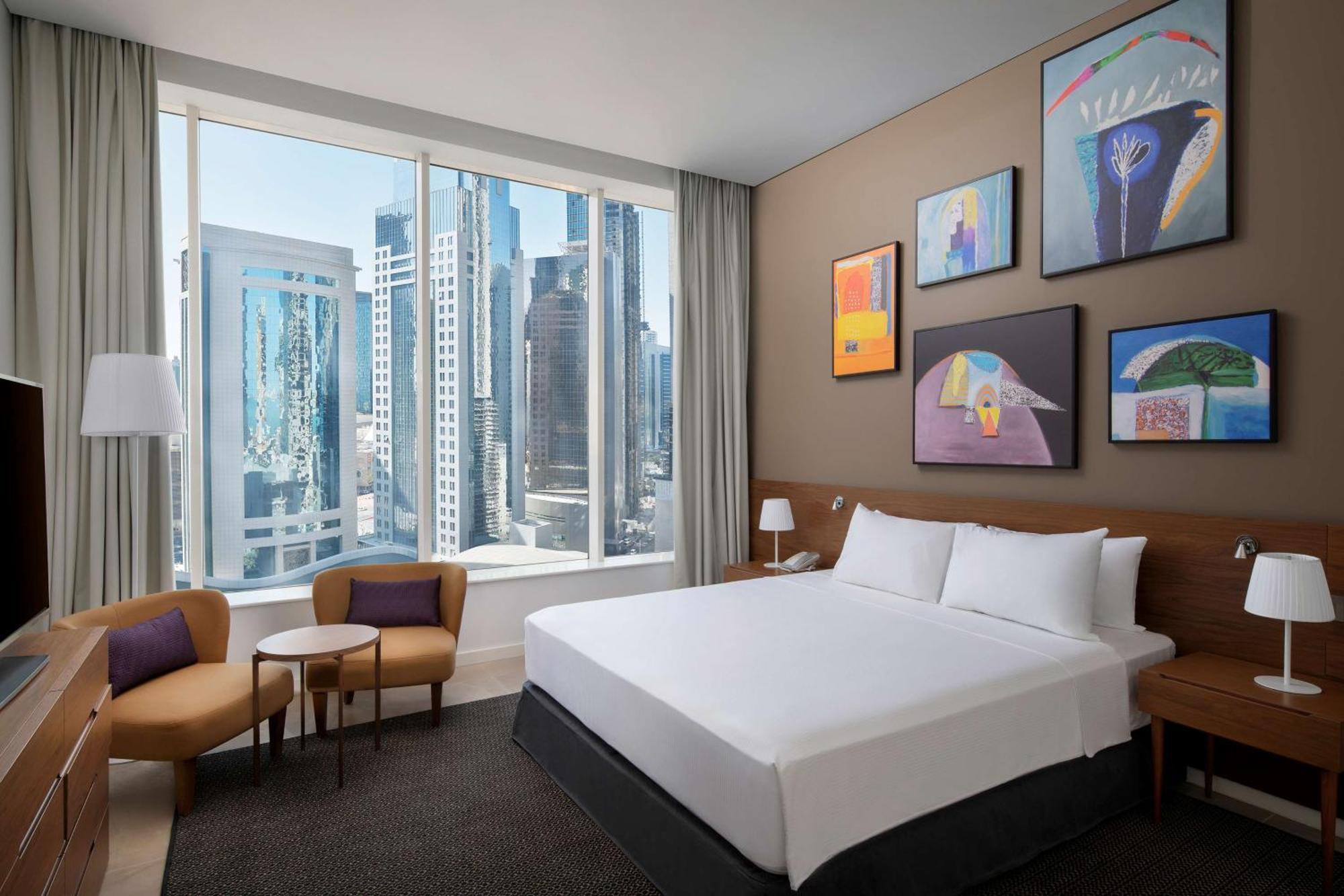 Aleph Doha Residences, Curio Collection By Hilton Exterior foto A guest room at the hotel