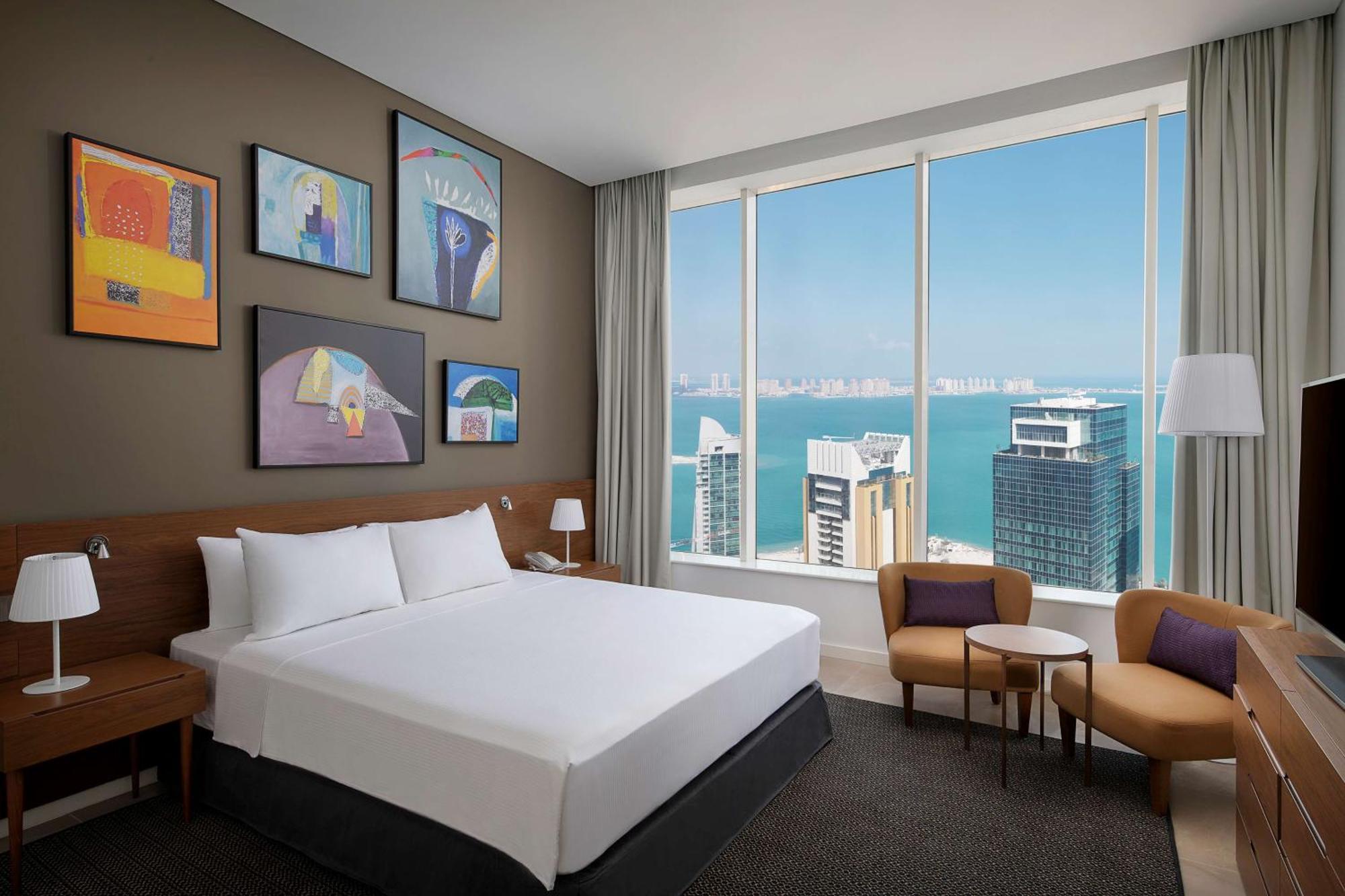 Aleph Doha Residences, Curio Collection By Hilton Exterior foto A guest room at the hotel