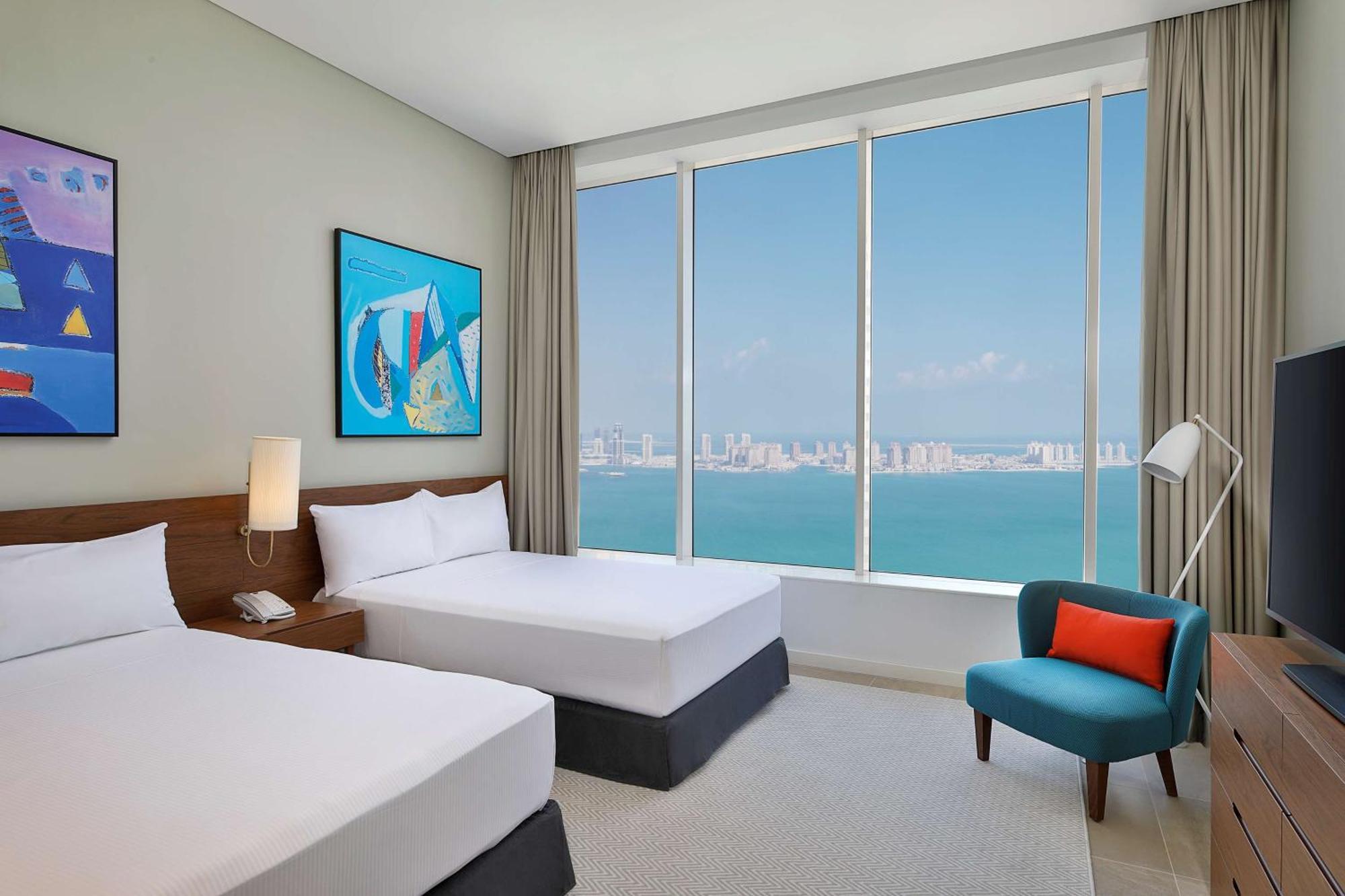 Aleph Doha Residences, Curio Collection By Hilton Exterior foto Guest room