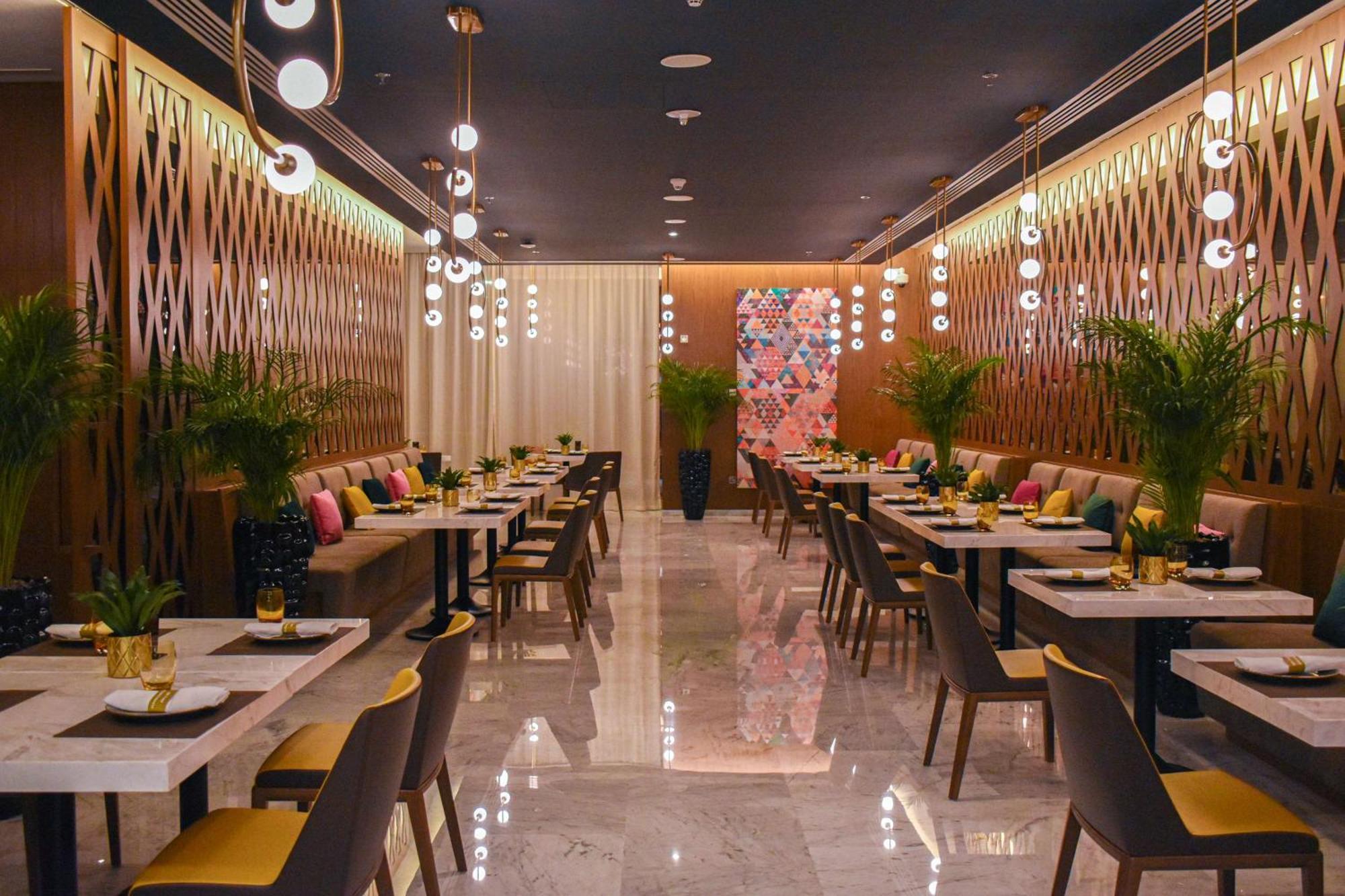 Aleph Doha Residences, Curio Collection By Hilton Exterior foto Restaurant interior